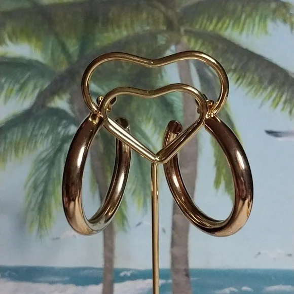 Pierced gold tone hollow hoop earrings - Picture 2 of 10